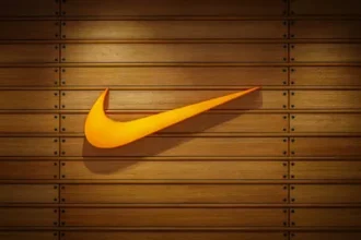 Nike store display showing various trainers and apparel.